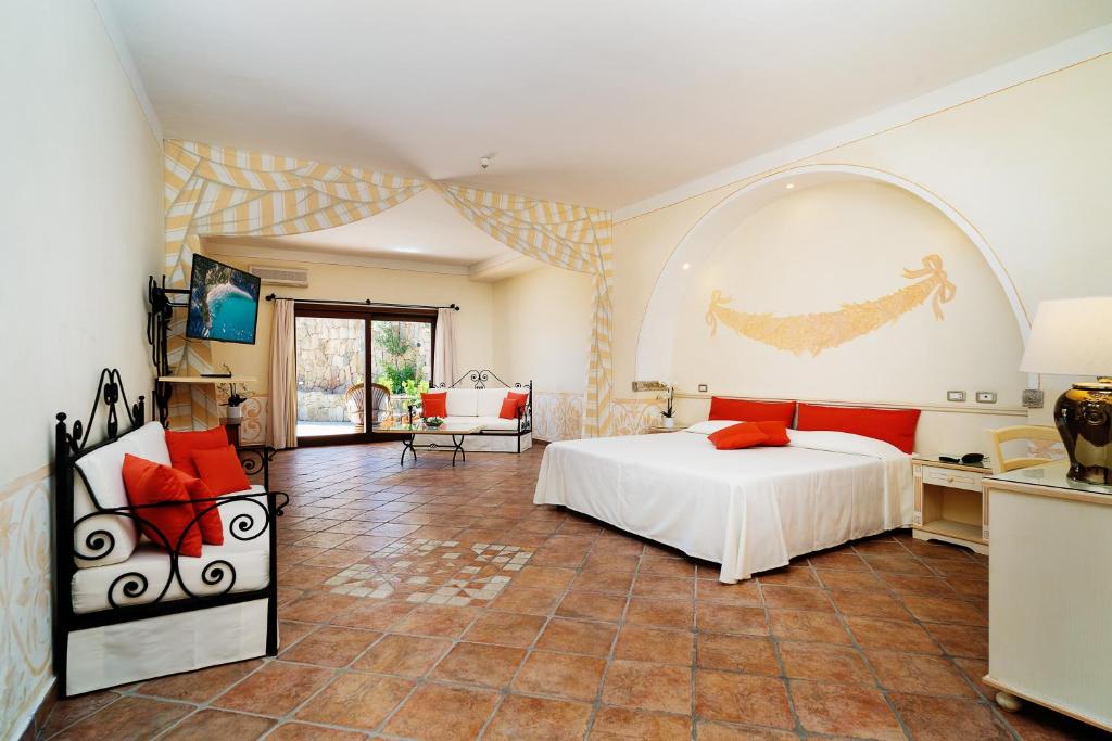 Postel nebo postele na pokoji v ubytování LH Hotel Pozzo Sacro