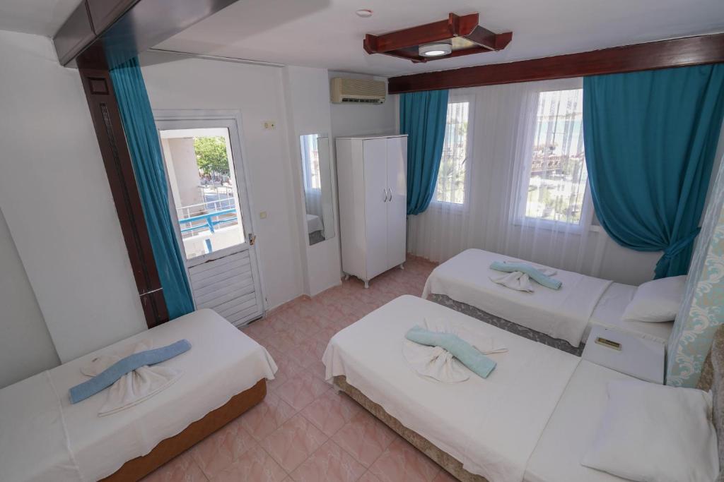 Postel nebo postele na pokoji v ubytování Arden Hotel