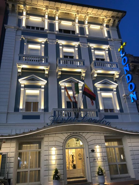 a hotel with a sign on the front of it at Hotel London in Viareggio