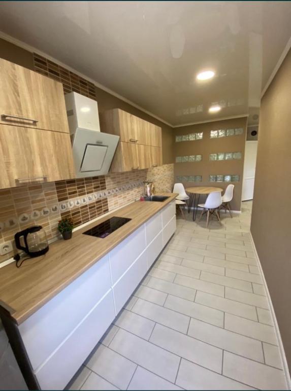 Апартаменты Well - Being - Viervoudige Kamer