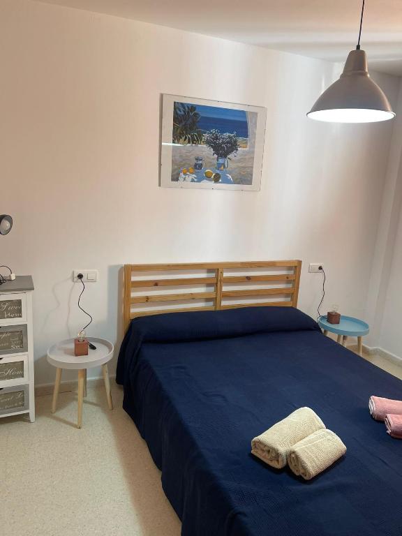 Postel nebo postele na pokoji v ubytování Playa de Los Lances