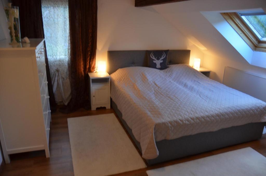 Postel nebo postele na pokoji v ubytování Grimming View