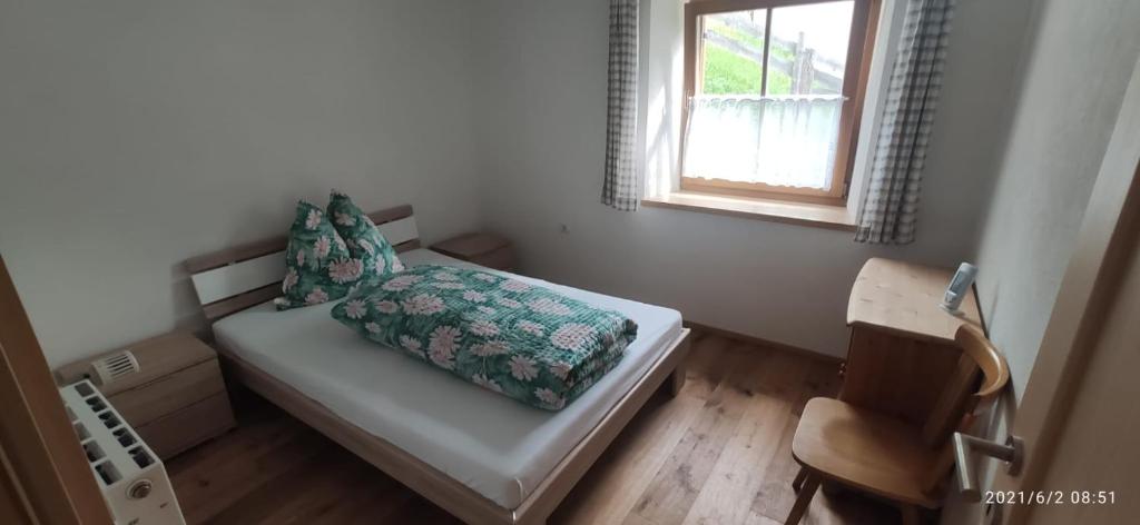 Postel nebo postele na pokoji v ubytování Appartements Klaus Bergheim