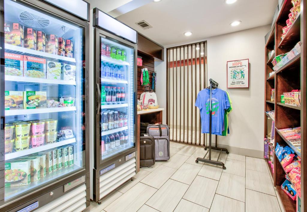 a grocery store aisle with a blue shirt in the refrigerator at Holiday Inn Express - Hope by IHG in Hope