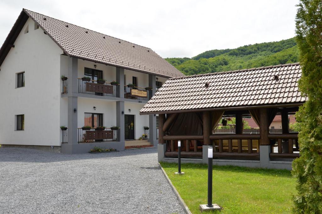 a couple of buildings with a building at Constantin Panzió in Praid