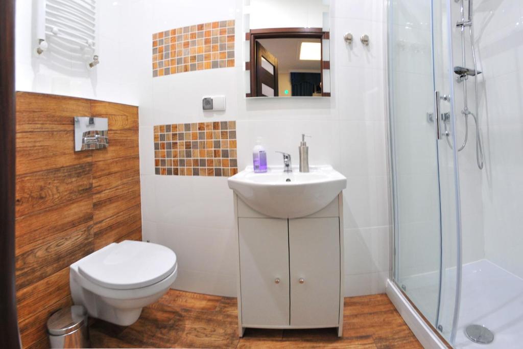 Koupelna v ubytování APARTAMENTY NA MNISZEJ