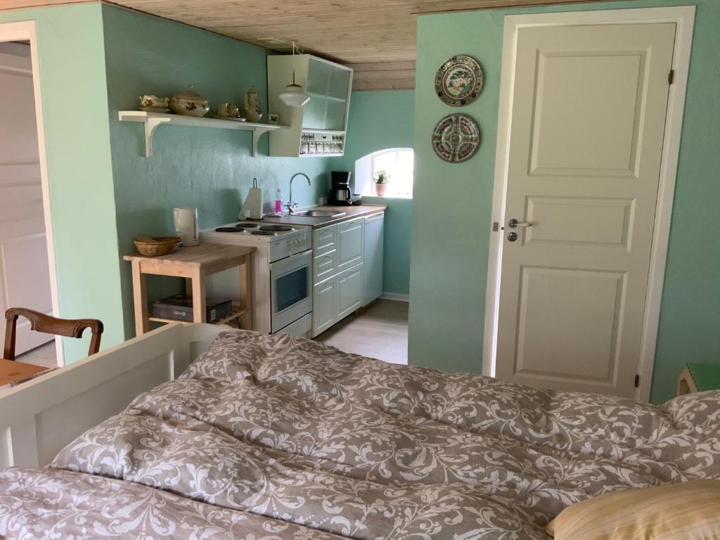 Kuchyň nebo kuchyňský kout v ubytování Brogaard Apartments