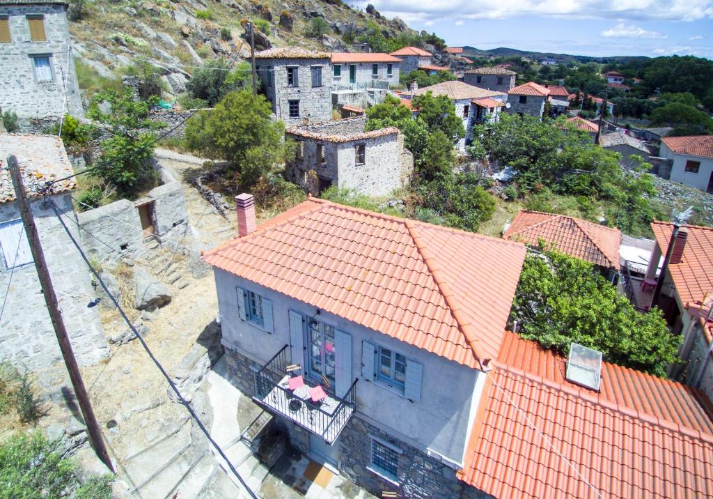 an overhead view of a house with an orange roof at Samaradiko in Kondiás