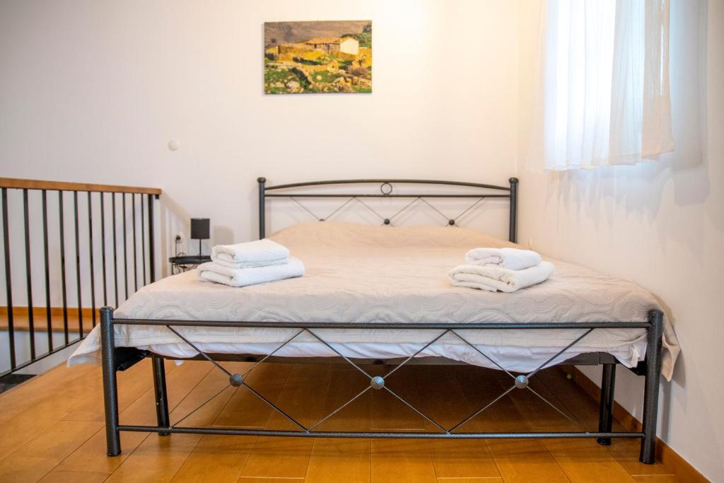 Cama ou camas em um quarto em Samaradiko