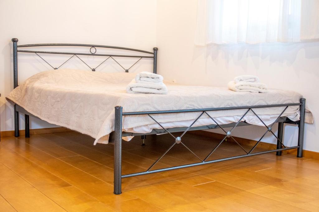 Cama ou camas em um quarto em Samaradiko