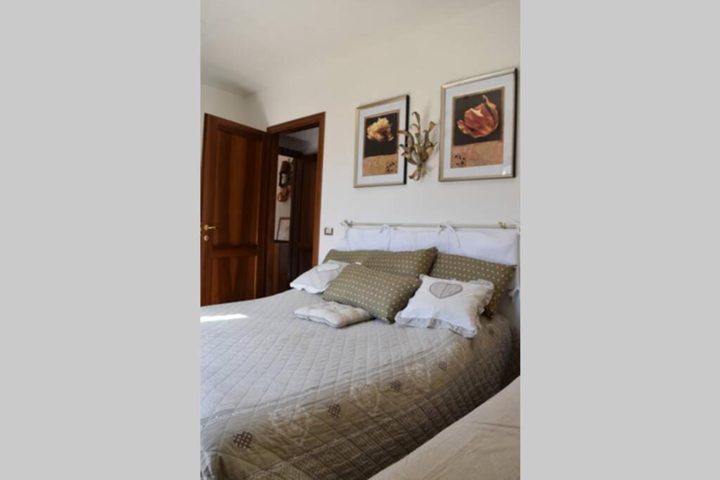 A bed or beds in a room at Casa vacanze al Castello