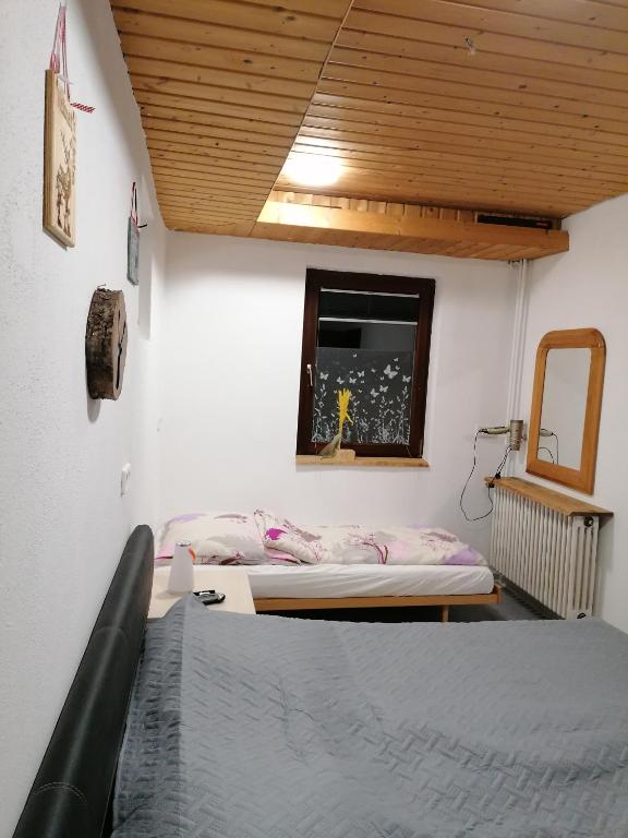 Postel nebo postele na pokoji v ubytování Schwarzwald Appartement
