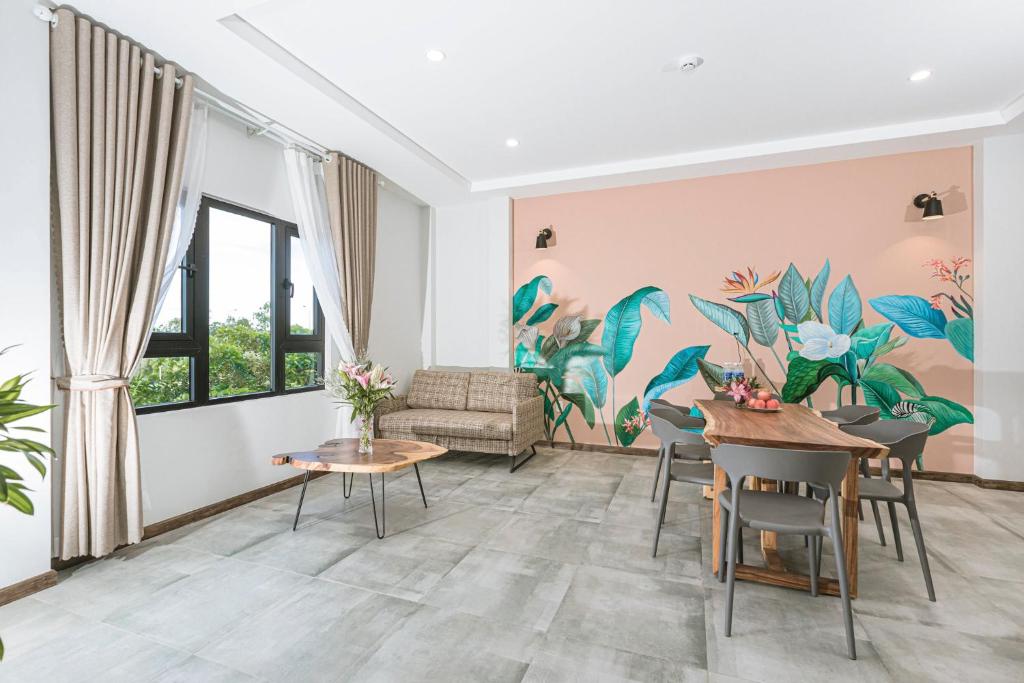Posezení v ubytování Trần Long Cù Hin Hotel