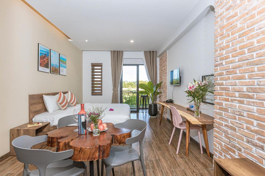 Posezení v ubytování Trần Long Cù Hin Hotel
