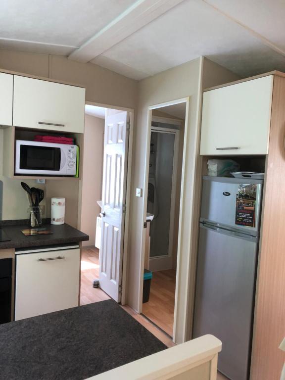 Kuchyň nebo kuchyňský kout v ubytování Mobilhome 2 Chambres 2 SDB