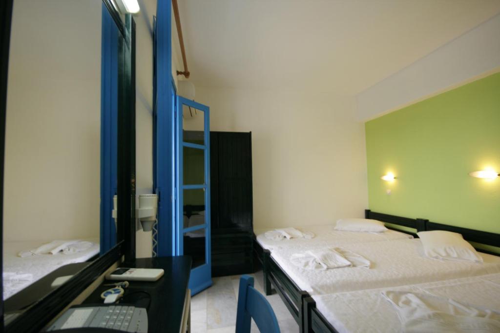 Posteľ alebo postele v izbe v ubytovaní Sunny Beach Studios