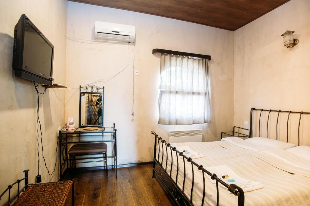 Postel nebo postele na pokoji v ubytování Chateau Eniseli