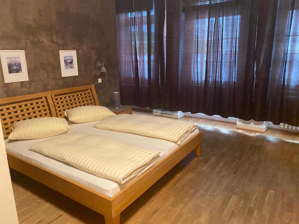 Postel nebo postele na pokoji v ubytování Hotel Restaurant Frankenturm