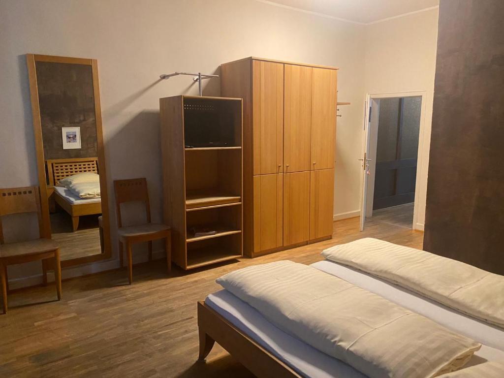 Postel nebo postele na pokoji v ubytování Hotel Restaurant Frankenturm
