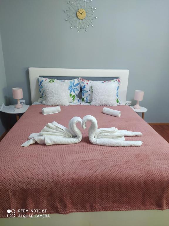 Postel nebo postele na pokoji v ubytování Apartman studio Pavle i Petra