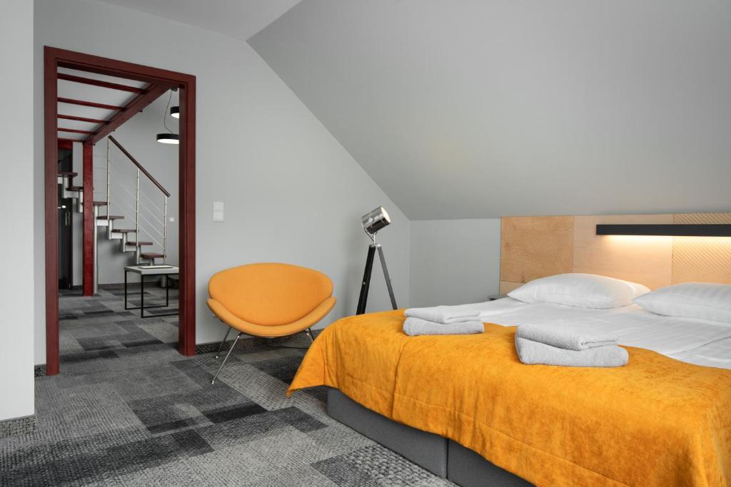 Postel nebo postele na pokoji v ubytování KRISTINA Willa & Spa