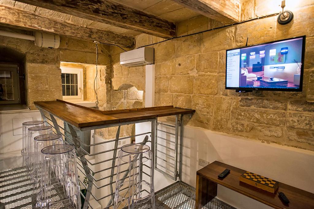 TV a/nebo společenská místnost v ubytování No 68 in Valletta