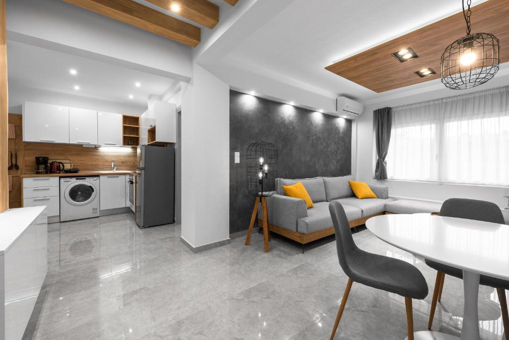 Kuchyňa alebo kuchynka v ubytovaní Wood n White, Nilie Hospitality MGMT