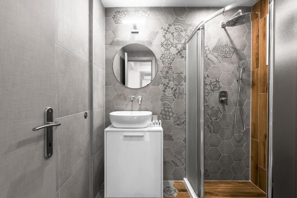 Kúpeľňa v ubytovaní Wood n White, Nilie Hospitality MGMT