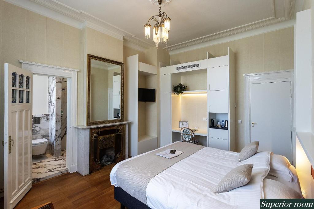 Postel nebo postele na pokoji v ubytování Boutique hotel Shamon