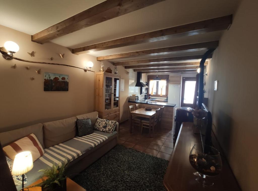 A bed or beds in a room at LAS 4 ESTACIONES - Rascafría