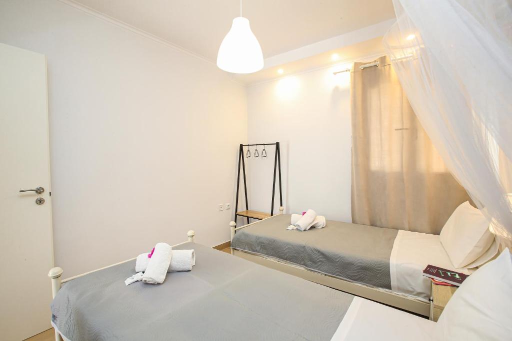 Postel nebo postele na pokoji v ubytování STAVROS HOUSE