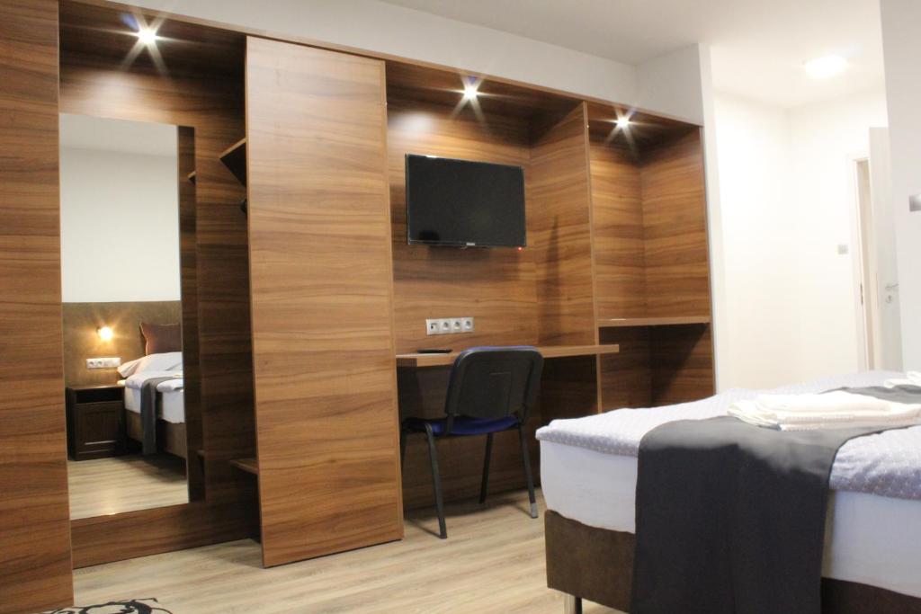Postel nebo postele na pokoji v ubytování Czermann Holiday Inn
