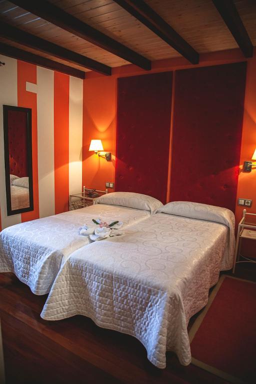 Postel nebo postele na pokoji v ubytování Posada Cicero