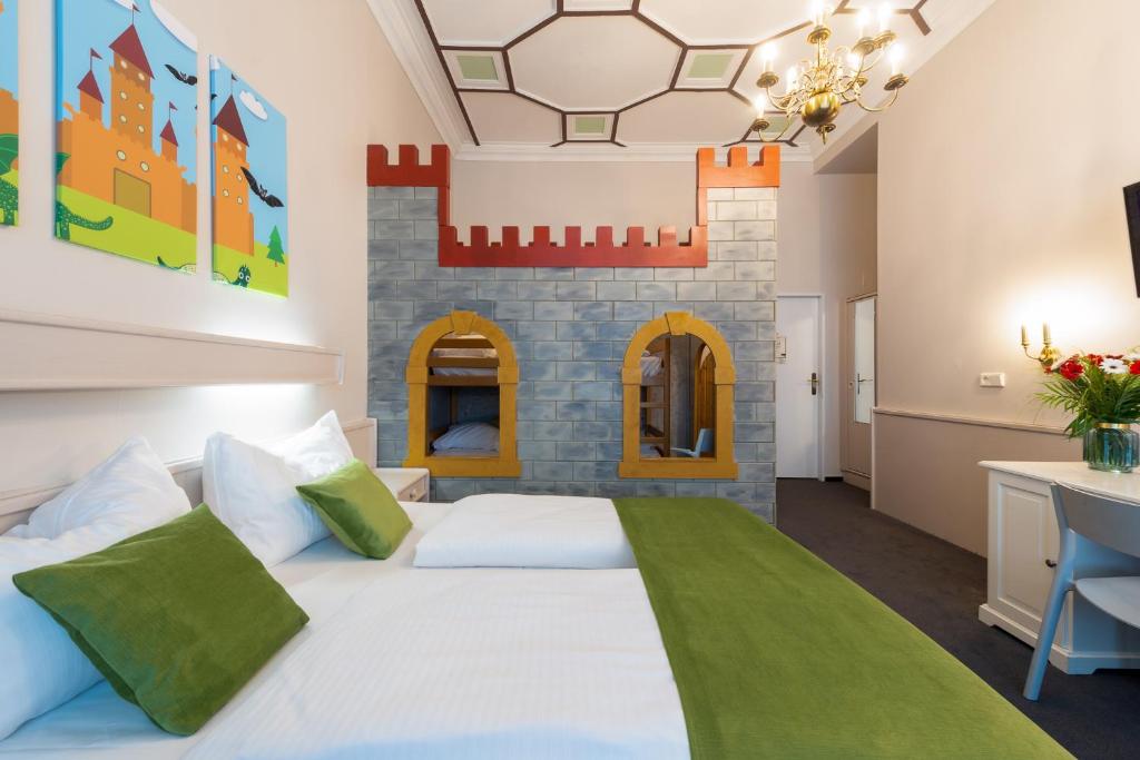 Postel nebo postele na pokoji v ubytování W22 Hotel am Kurfürstendamm