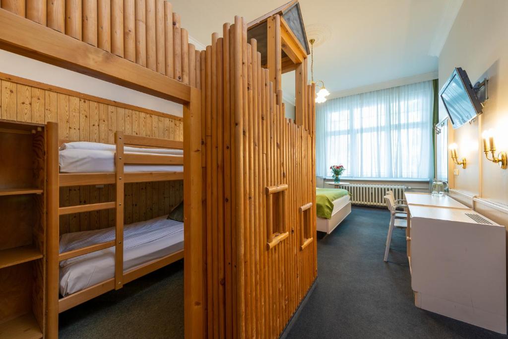 Postel nebo postele na pokoji v ubytování W22 Hotel am Kurfürstendamm
