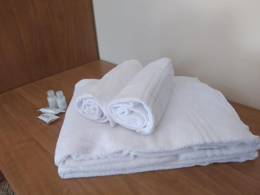Postel nebo postele na pokoji v ubytování Hotel Luisa