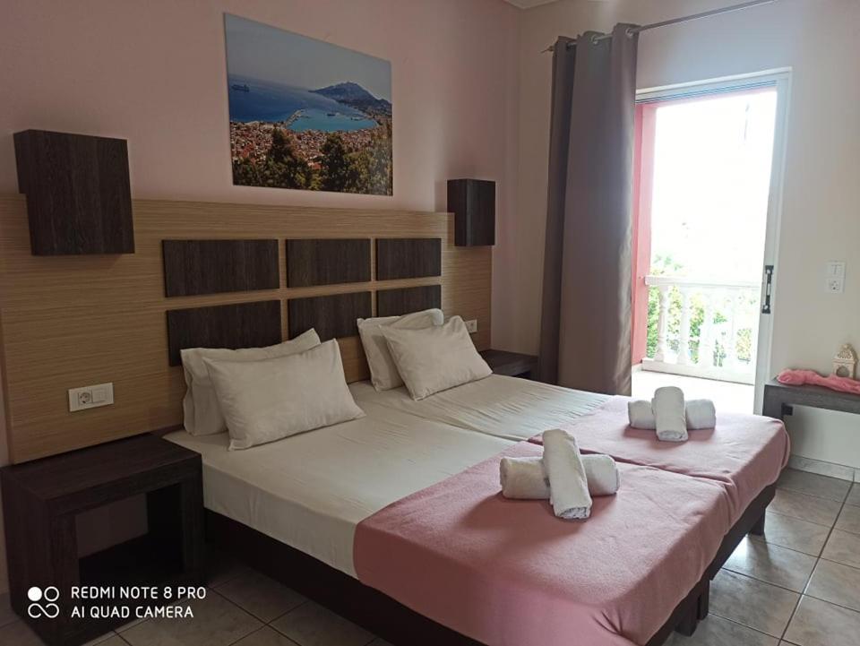 Ένα ή περισσότερα κρεβάτια σε δωμάτιο στο No Name Apartments