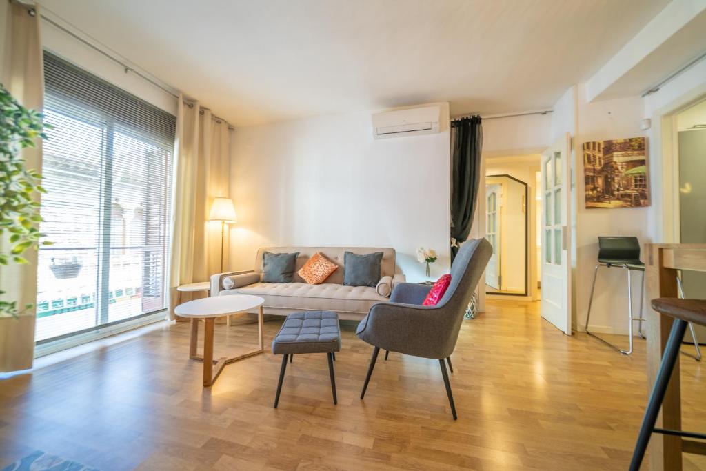 Posedenie v ubytovaní HomeHolidaysRentals Plume - Costa Barcelona
