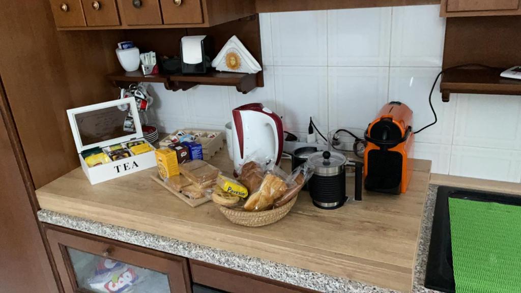 Kuchyň nebo kuchyňský kout v ubytování B&B Fiume