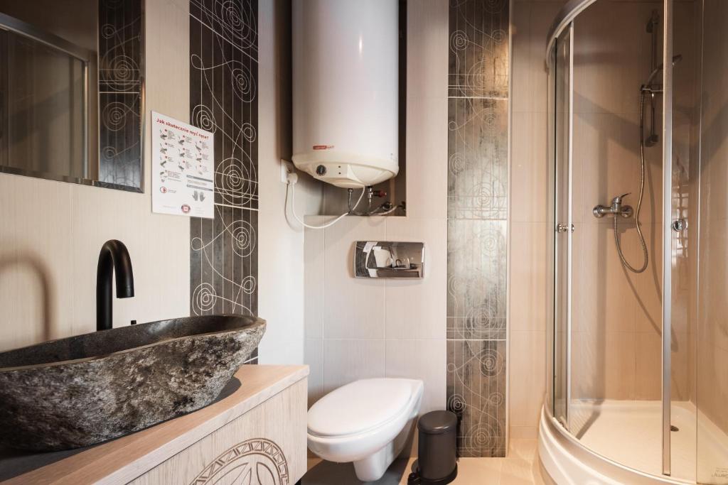 Kúpeľňa v ubytovaní Apartamenty Butorowy Zakopane