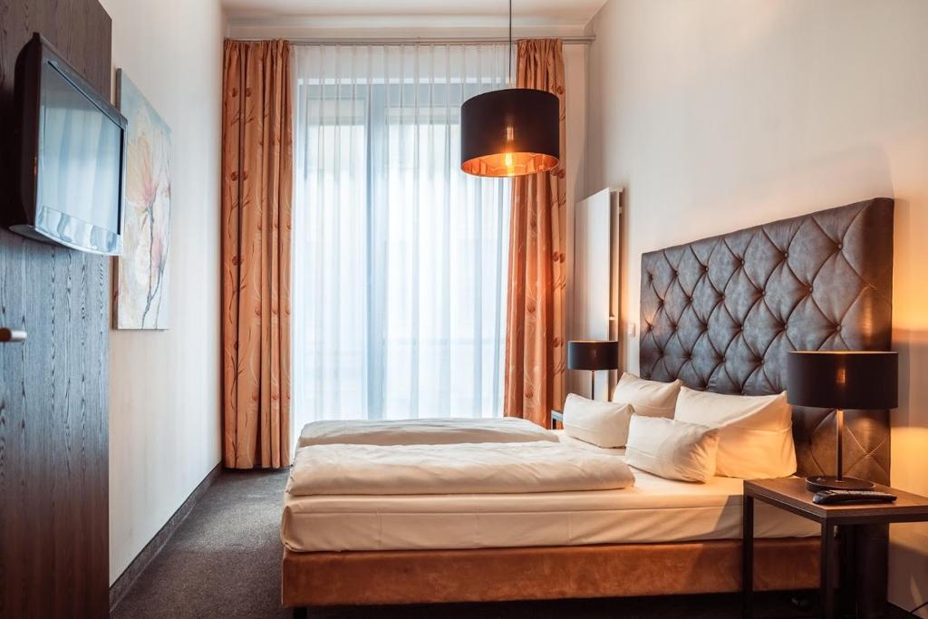 Aparthotel Neumarkt - Resim 9