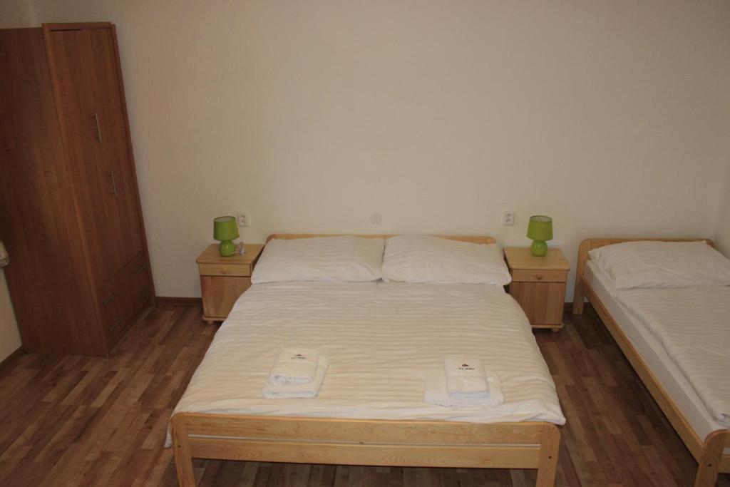 Postel nebo postele na pokoji v ubytování Dom Via Jasná Demänová