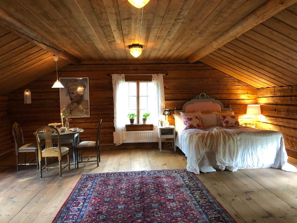 Postel nebo postele na pokoji v ubytování Träslottets B&B