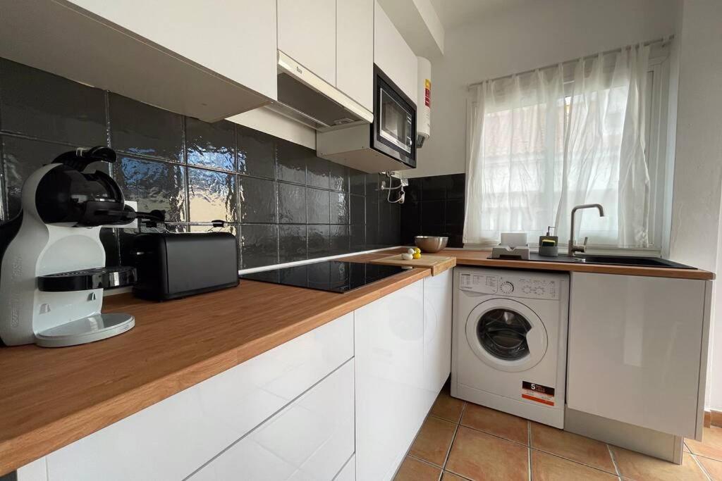 Kuchyň nebo kuchyňský kout v ubytování Your URBAN HOME