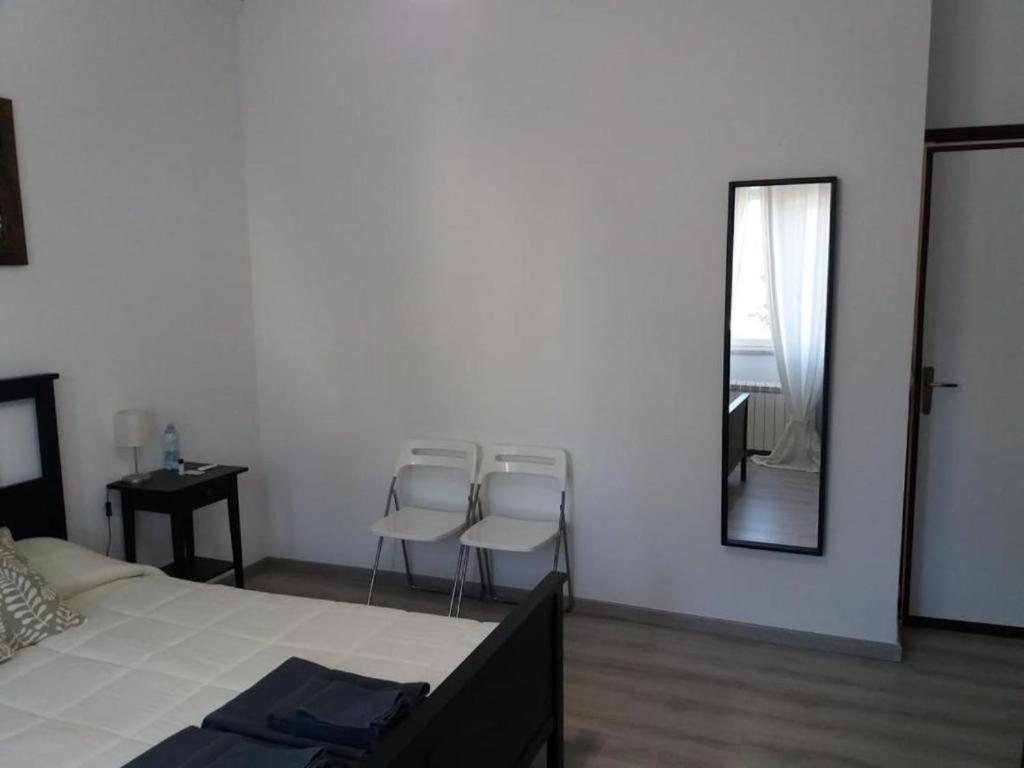 A bed or beds in a room at Il Merlo