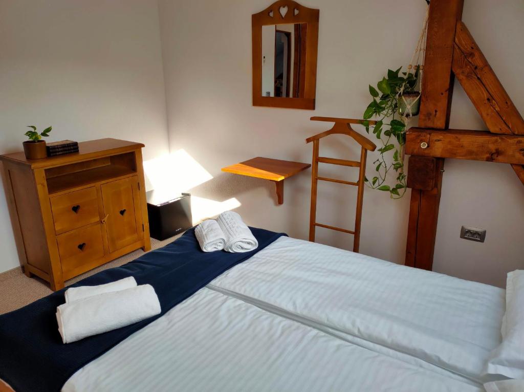 Postel nebo postele na pokoji v ubytování Casa Dávid Ferenc Ház