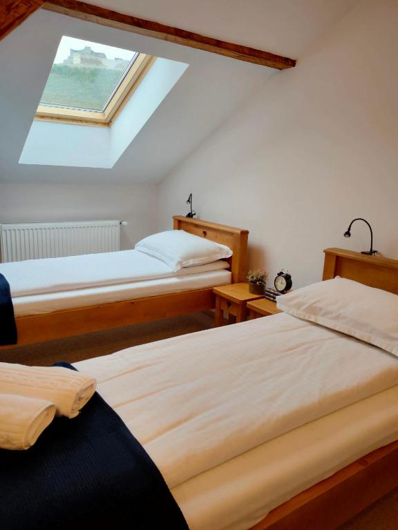 Postel nebo postele na pokoji v ubytování Casa Dávid Ferenc Ház