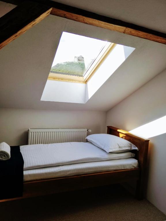 Postel nebo postele na pokoji v ubytování Casa Dávid Ferenc Ház