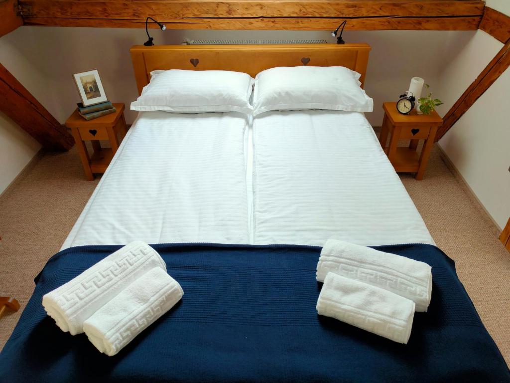 Postel nebo postele na pokoji v ubytování Casa Dávid Ferenc Ház