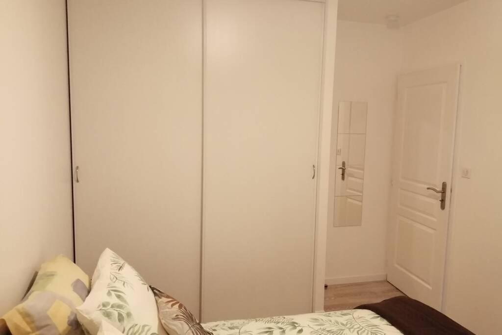 Postel nebo postele na pokoji v ubytování Appart'Hôtel Lagnieu